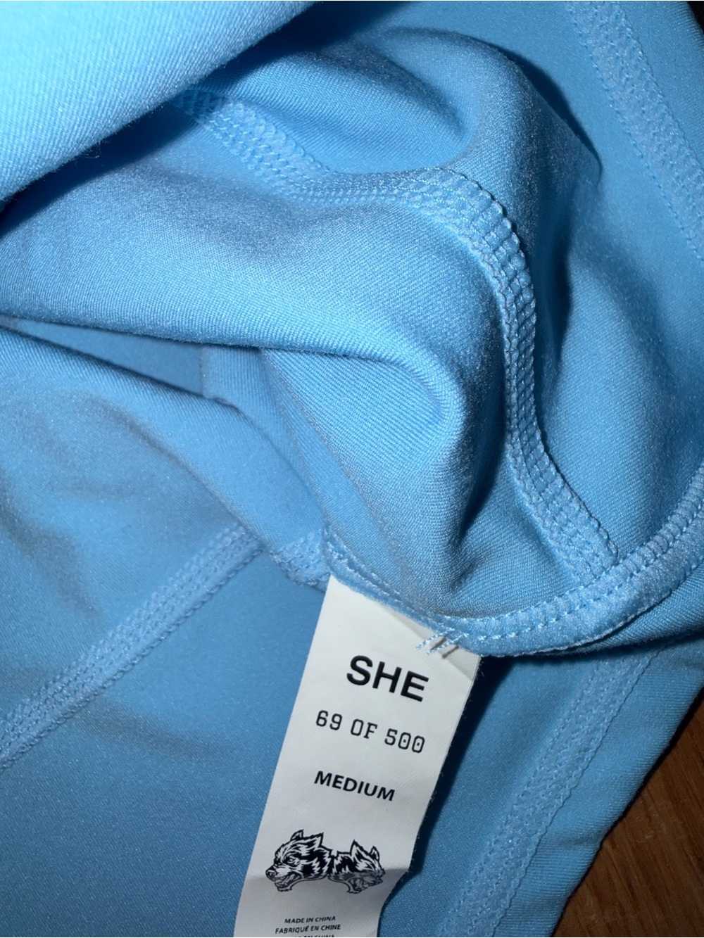 Darc Sport Light Blue Zip-Front Women's Top with Graphic Detail - Picture 2 of 3